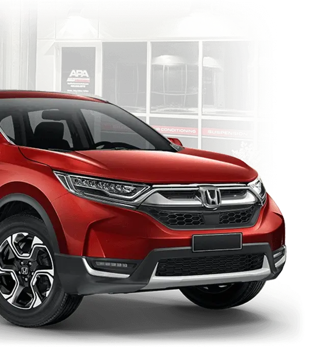 Red Honda SUV vehicle parked outside of APA Total Car Care in Queen Creek, AZ